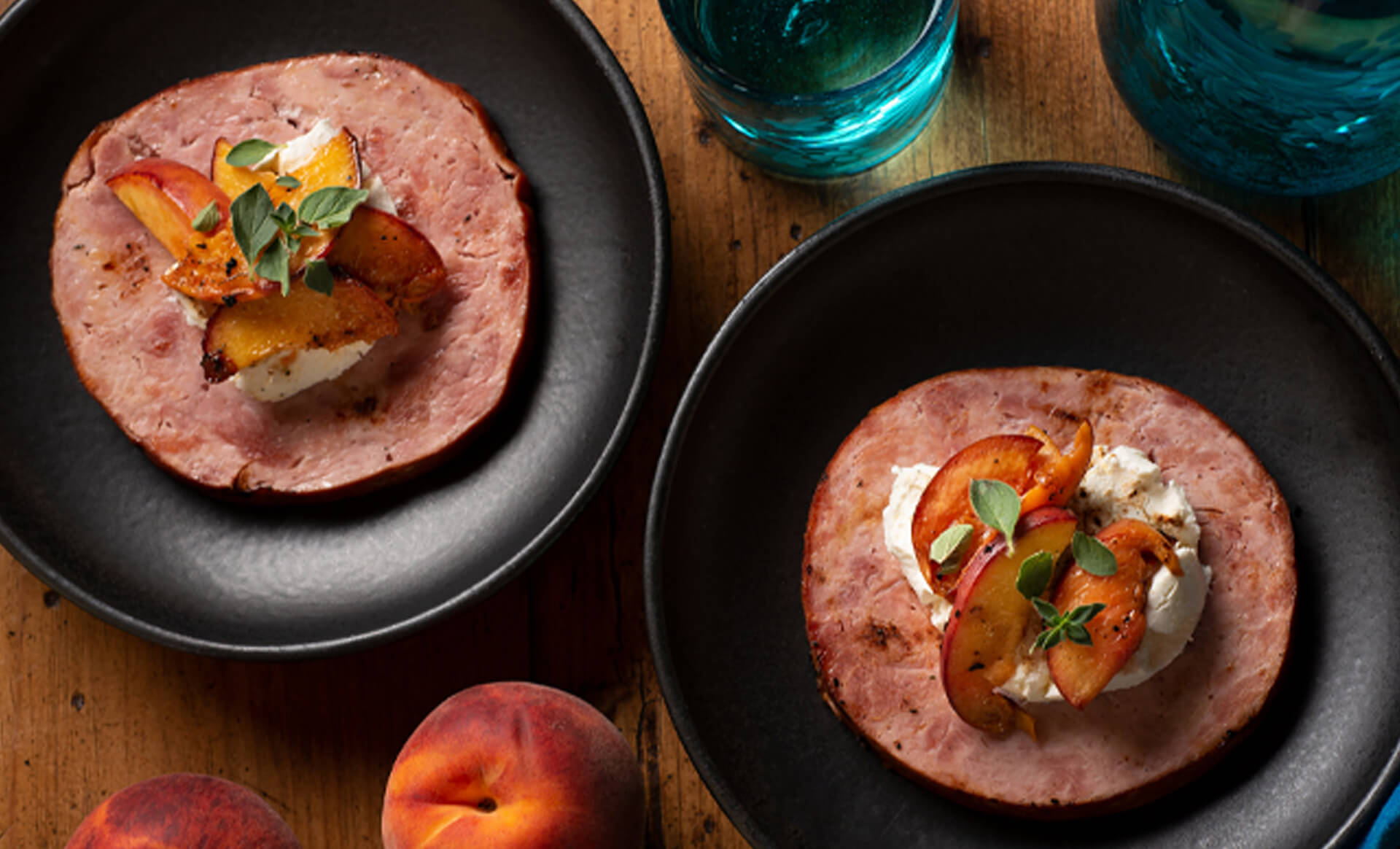 Grilled Ham Steaks with Goat Cheese and Fresh Peaches