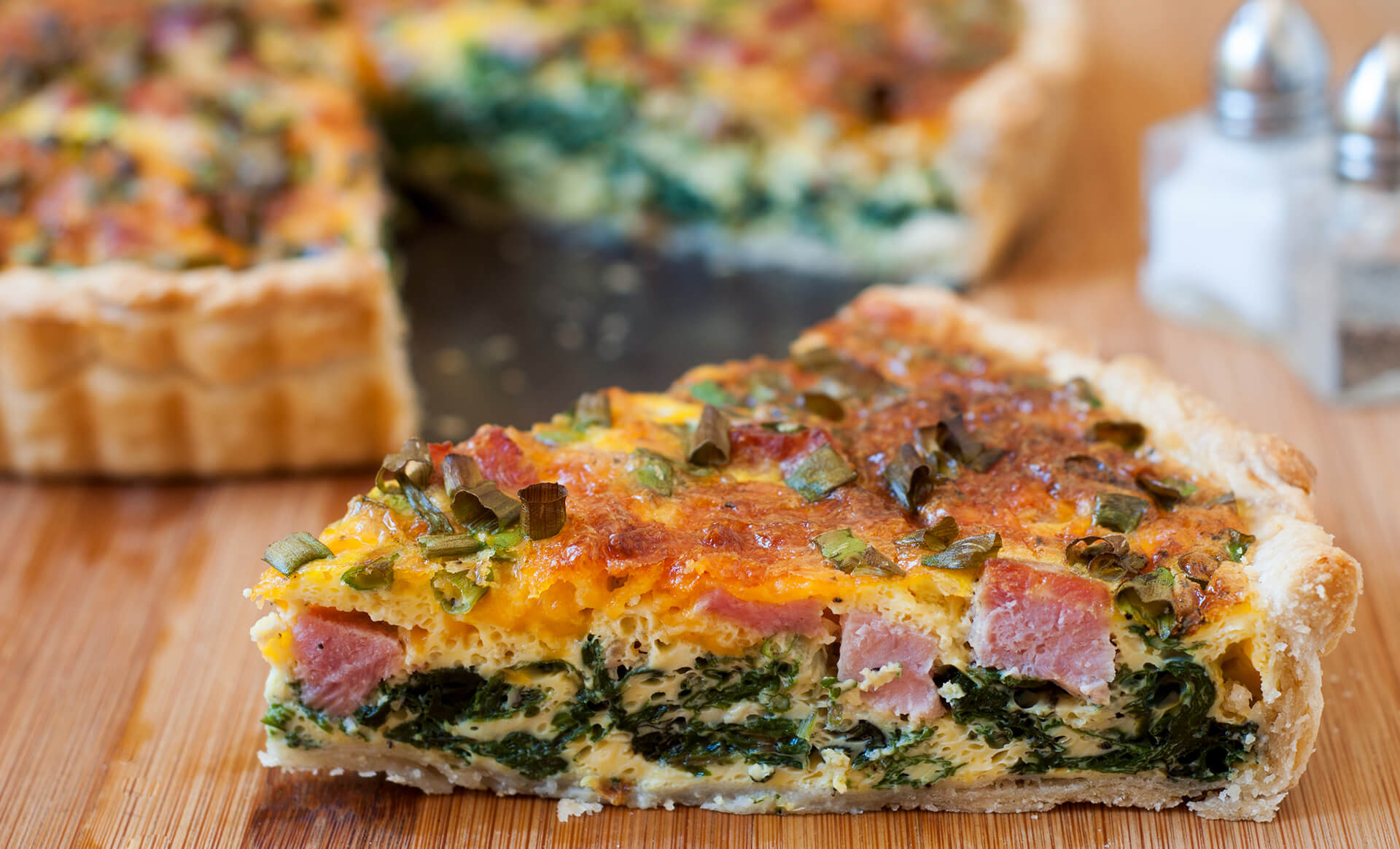 Ham and Cheese Quiche with Swiss Chard and Green Onions • Coleman Natural