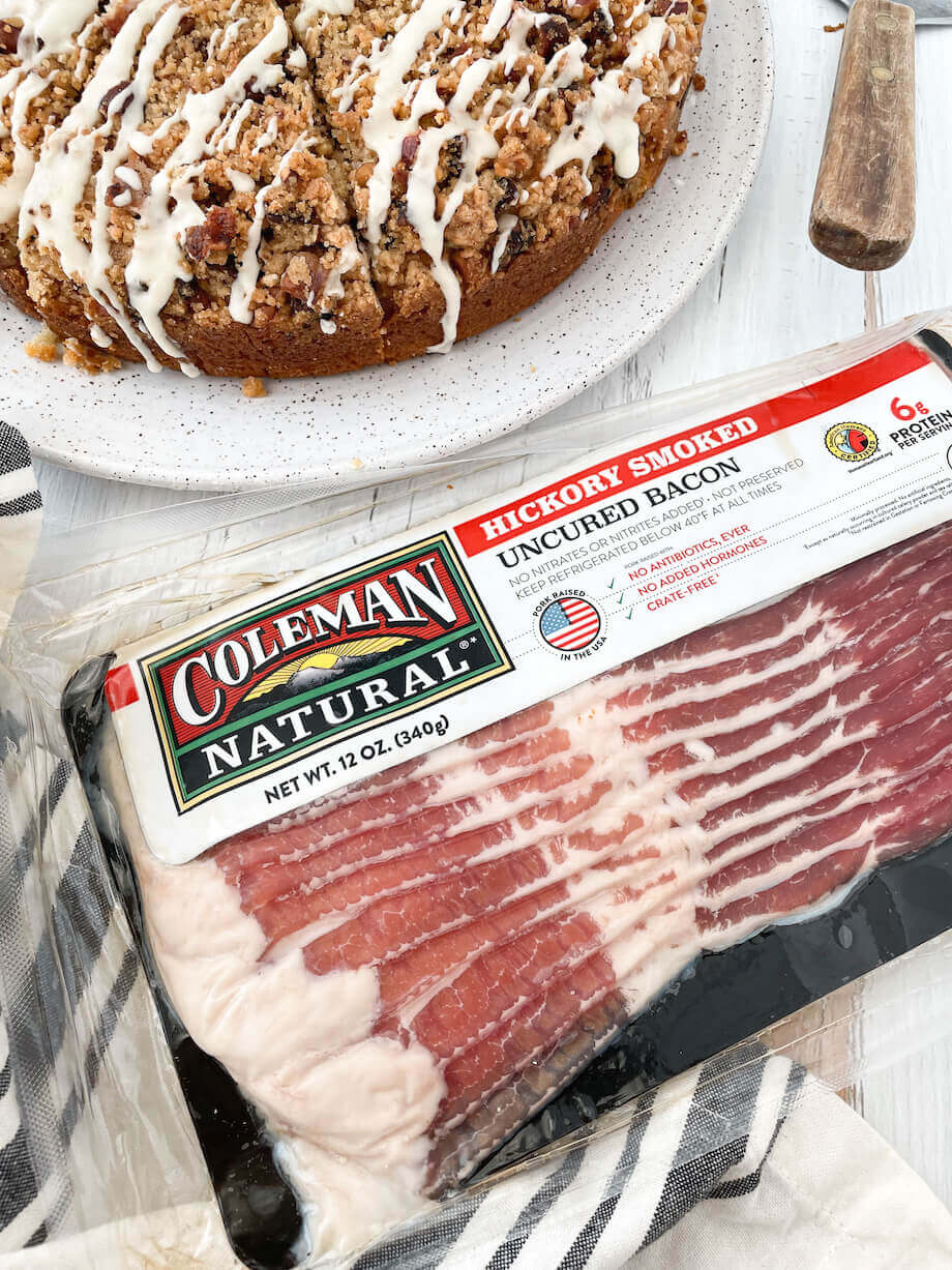 https://www.colemannatural.com/wp-content/uploads/2022/02/Hickory-smoked-bacon-next-to-a-maple-bacon-coffee-cake-920.jpg