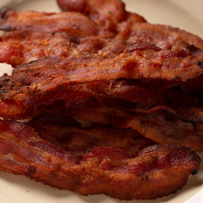 We've been cooking bacon all wrong Americans say it should be boiled in  water